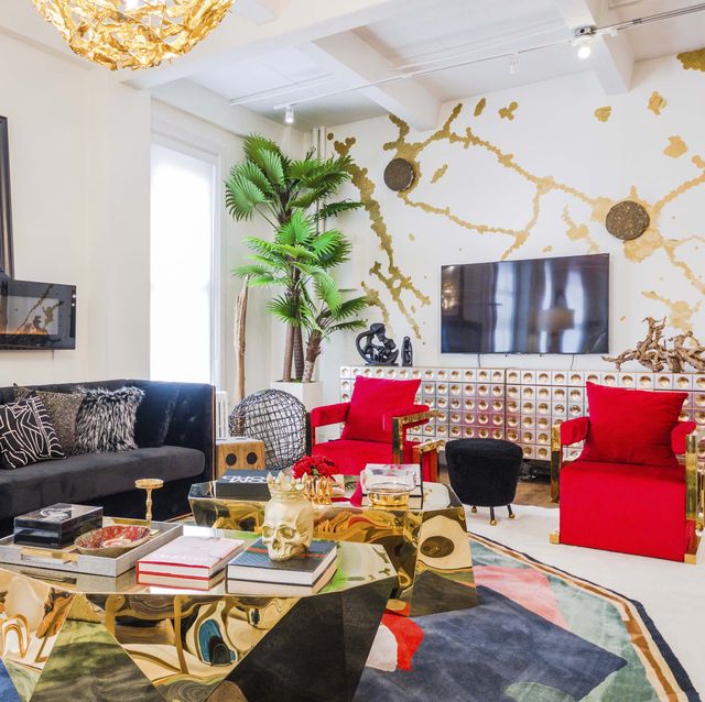 red chairs, living room, gold wall