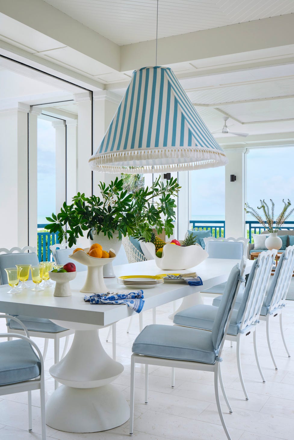 captiva island\, florida beach home designed by janie molster and her partner\, kate stikeleather. outdoor dining. captiva island\, florida beach home designed by janie molster and her partner\, kate stikeleather. outdoor dining.
