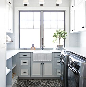 modern laundry room with farmhouse sink