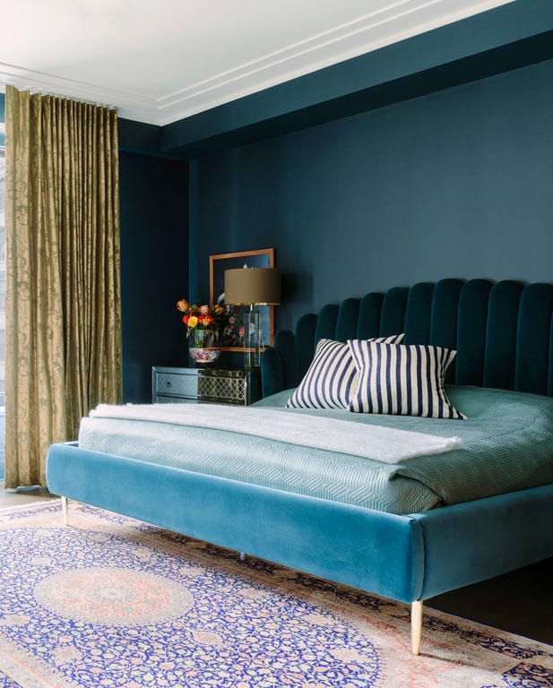 christopher kent project shades of blue and a velvet platform bed set the mood in this chicago bedroom by kent, founder of studio cak