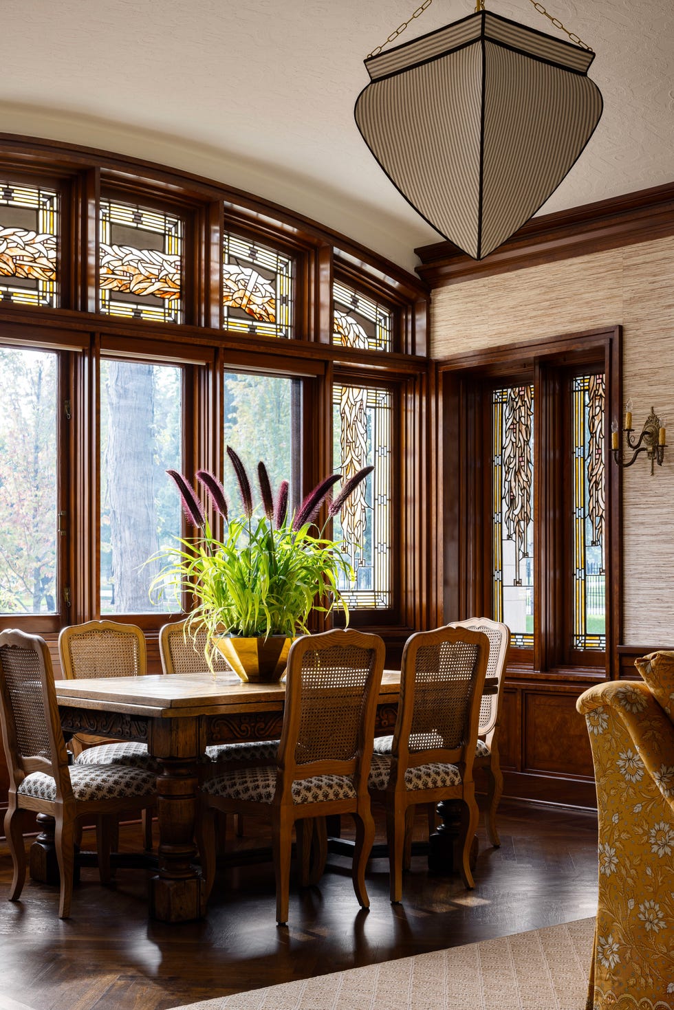 a dining room with a large window