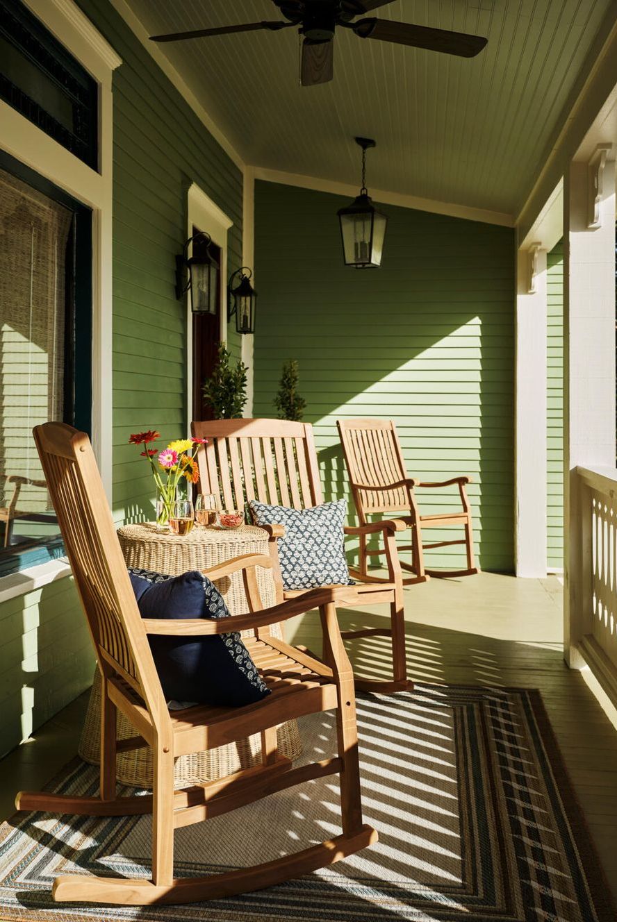 green porch with green flooring and walls