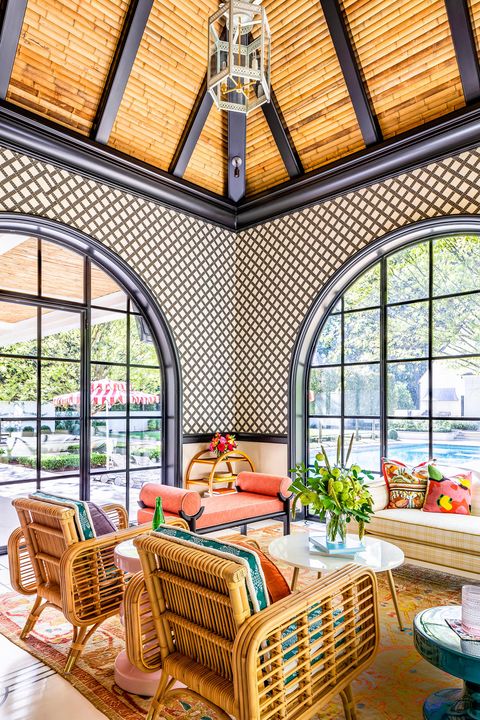 charlotte lucas sunroom with wicker furniture