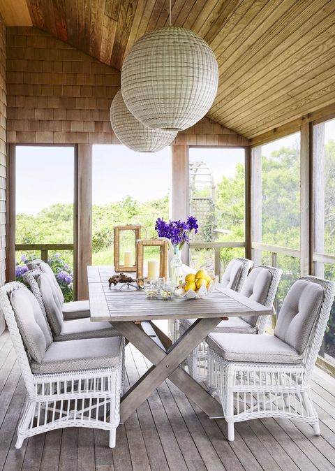 screened porch with chandelier