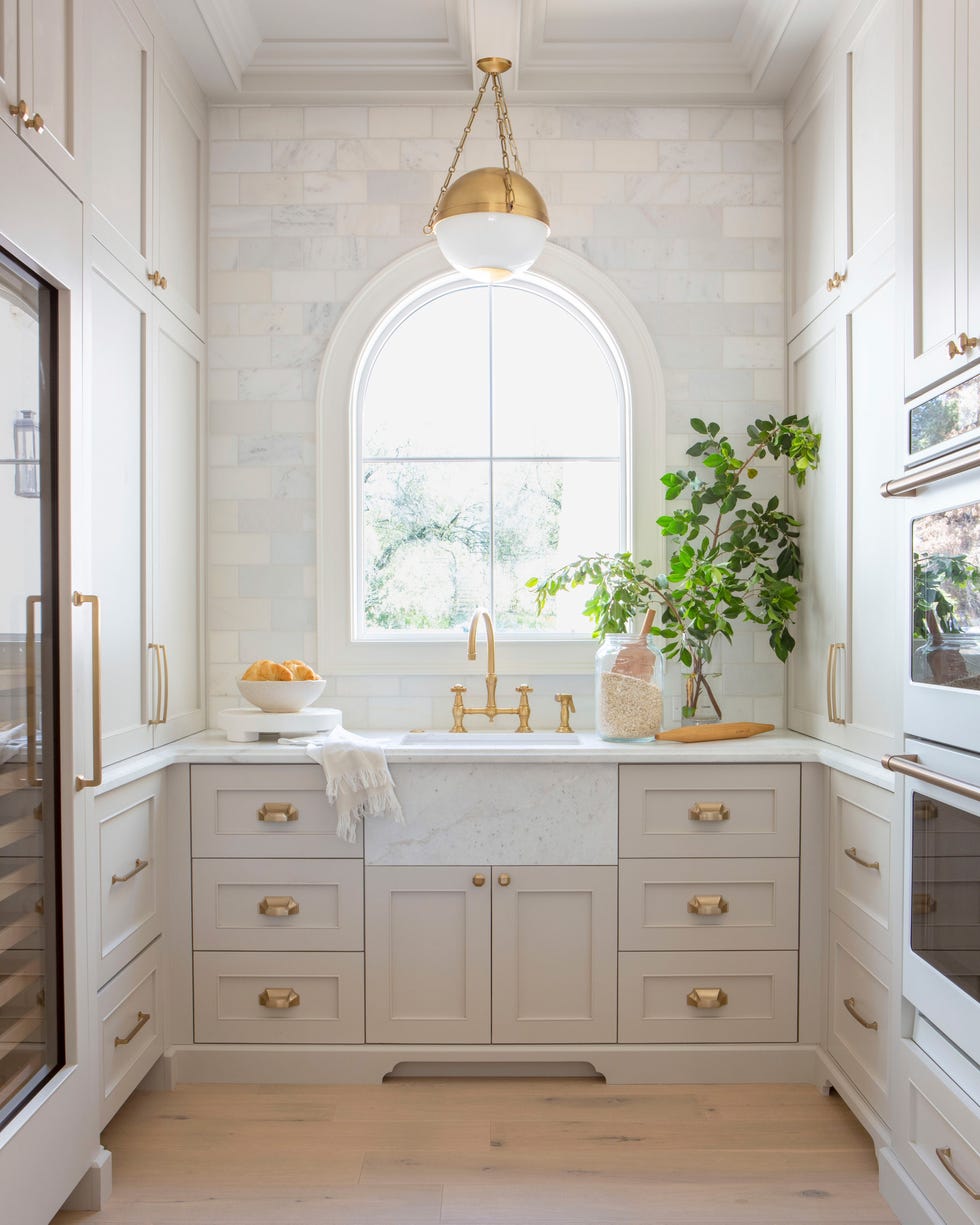 a kitchen with a large window