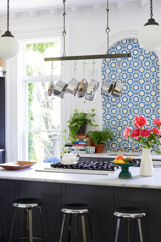 colorful, patterned encaustic tile with a moroccan feel livens up the backsplash in christina nielsens restored brooklyn townhouse traditionally, encaustic tiles were cement, but now they make porcelain look alikes colorful, patterned encaustic tile with a moroccan feel livens up the backsplash in christina nielsens restored brooklyn townhouse traditionally, encaustic tiles were cement, but now they make porcelain look alikes