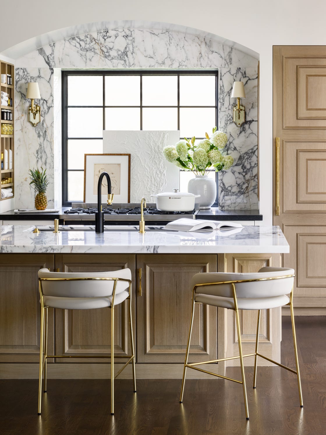 a kitchen with a marble counter top