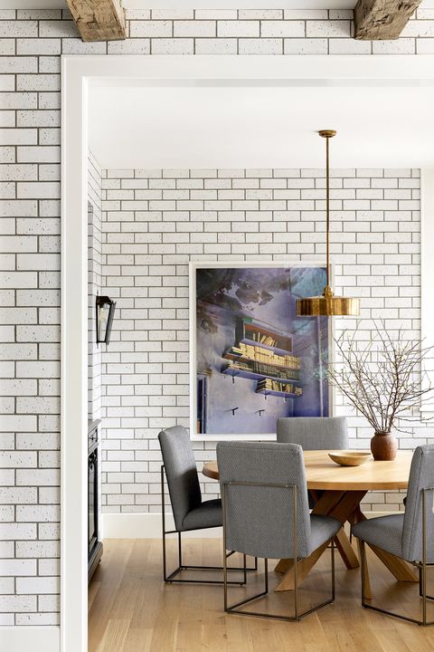 dining room with white subway tile