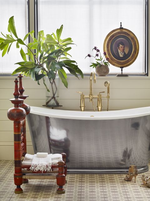 eclectic bathroom with silver tub designed by meredith mcbrearty in fort worth