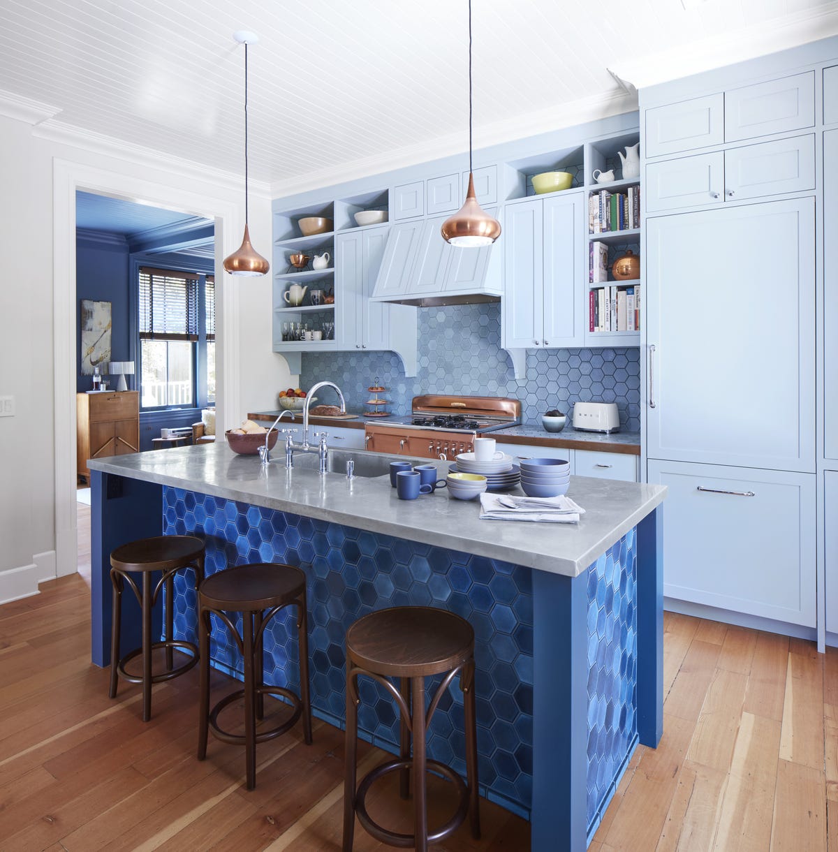 elle-decor-blue-kitchen-keeping-room-fireplace - The Glam Pad