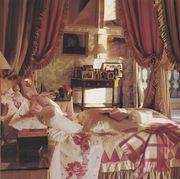 bedroom, canopy bed with red and gold curtains