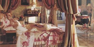 bedroom, canopy bed with red and gold curtains