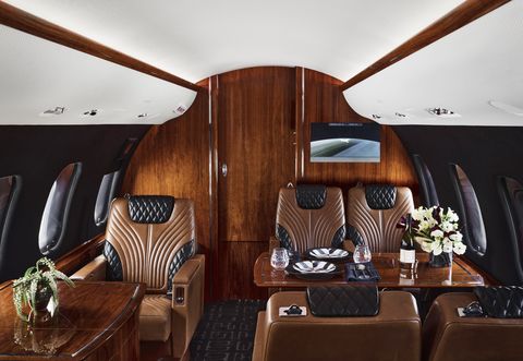 bombardier global express plane, brown leather seats, dining table
