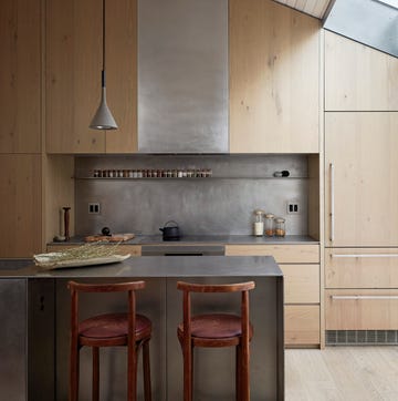 wooden kitchen, wooden bar stools, ceiling lamp