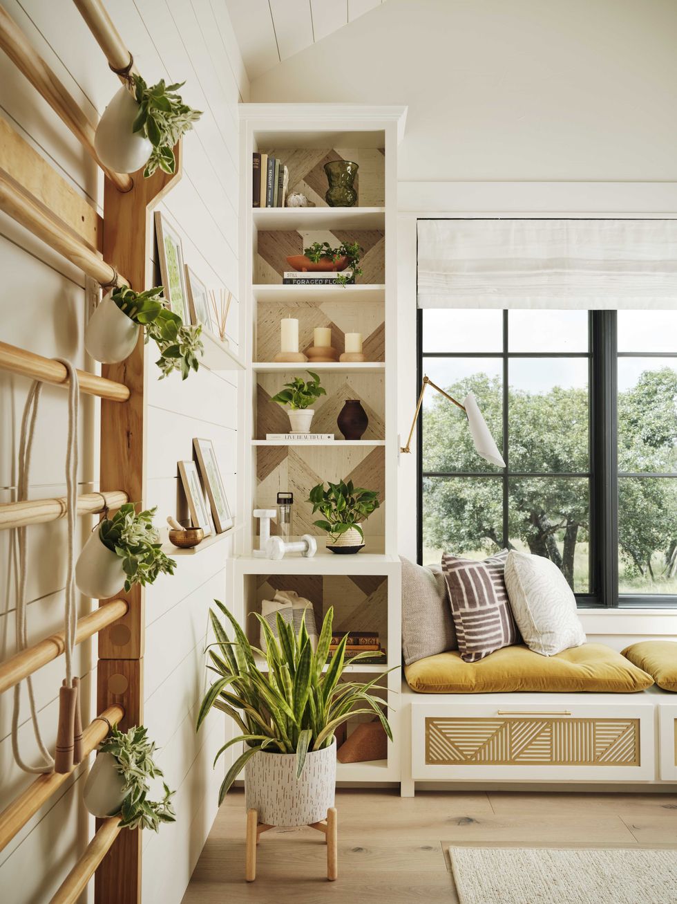 window seat, home office and home gym, indoor plants, white storage cabinets