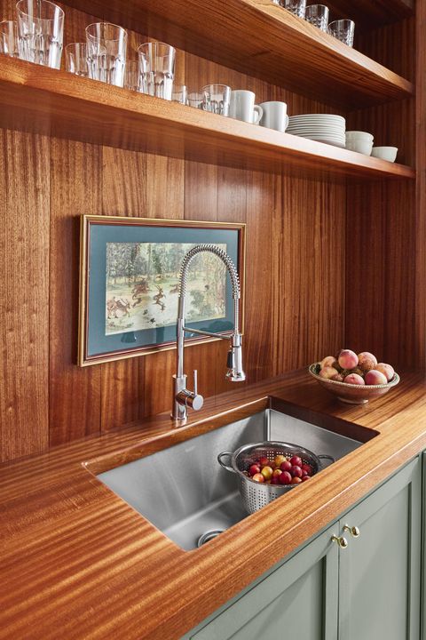 wooden countertop, faucet, kitchen sink