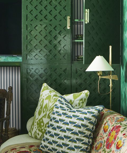 green cabinets, lights, lamps, floral couch