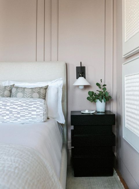 light pink wall primary bedroom