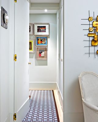 White, Yellow, Room, Orange, Wall, Interior design, Shelf, Stairs, Building, Furniture, 