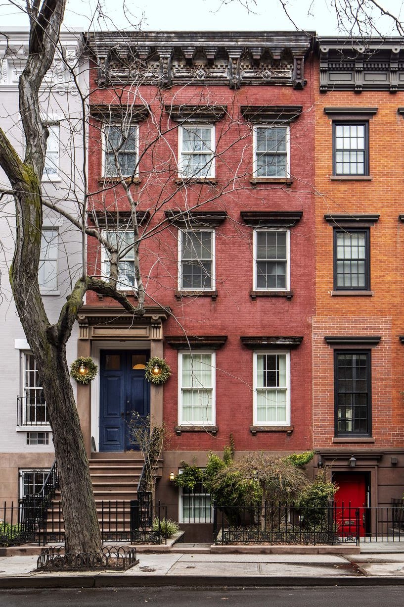 a tree in front of a building