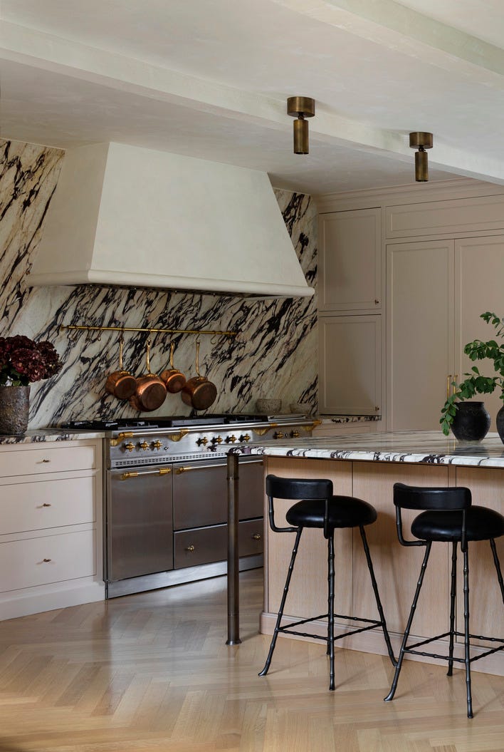 hold the line elegant design\, neutral color palette chicago home designed by wendy labrum with michael abraham architecture inspiration english country estate with a contemporary twist kitchen reclaimed wood beams frame the kitchen and keep the striking calacatta viola backsplash and counters from skewing too modern range lacanche lighting apparatus faucet waterworks stools rose uniacke kitchen island hold the line elegant design\, neutral color palette chicago home designed by wendy labrum with michael abraham architecture inspiration english country estate with a contemporary twist kitchen reclaimed wood beams frame the kitchen and keep the striking calacatta viola backsplash and counters from skewing too modern range lacanche lighting apparatus faucet waterworks stools rose uniacke kitchen island