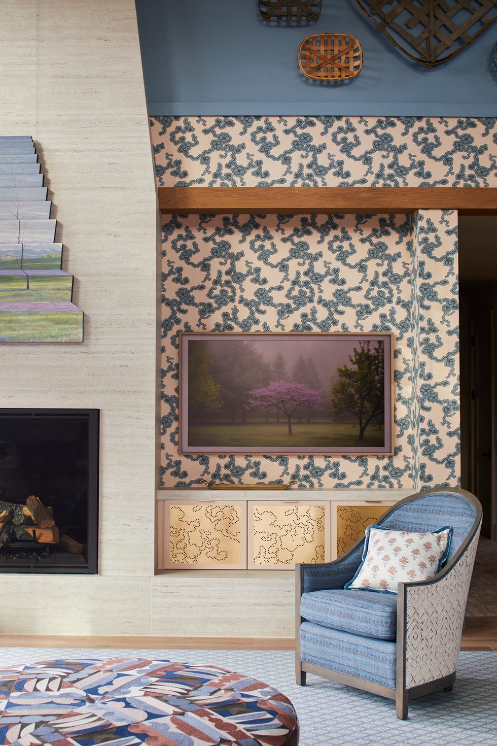 the living dining room by dane austin design daneaustindesign floor to ceiling chimney breast, constructed with cosentino dekton ultracompact surface material a farrow ball cherry blossom inspired wallpaper reproduced from a design discovered in an 18th century chacircteau is a stunning backdrop blue walls, tv niche, brass cabinet panel inserts by architectural grille evoke the farrow ball wallpaper above, while a samsung frame tv living room, dining room