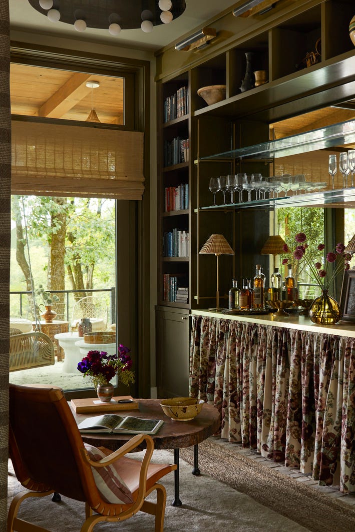 reading room anne mcdonald design annemcdonalddesign intimate, cozy retreat, custom millwork, luxurious solitude, antiqued mirror and brass shelf brackets from architectural grille, floating shelves, the bottom half of the built in is dressed with a floral skirt, softening the boxy architecture of the petite space tactile elements, like a midcentury chair, 1970s limestone console, and silky goat hair rug, encourage guests to cross the threshold to top it all off, a visual comfort co chandelier with alabaster globes adds a touch of vintage glamour overhead balancing the hard and soft here was all about a curated mix of textures shelf hardware brackets and cafe curtain rod architectural grille lighting visual comfort co shades hunter douglas drapery clarence house rugs safar top, fibreworks bottom whole home 2024 this years energy efficient home is in the conservation minded community of sprout, located on a private nature preserve in hendersonville, north carolina reading room anne mcdonald design annemcdonalddesign intimate, cozy retreat, custom millwork, luxurious solitude, antiqued mirror and brass shelf brackets from architectural grille, floating shelves, the bottom half of the built in is dressed with a floral skirt, softening the boxy architecture of the petite space tactile elements, like a midcentury chair, 1970s limestone console, and silky goat hair rug, encourage guests to cross the threshold to top it all off, a visual comfort co chandelier with alabaster globes adds a touch of vintage glamour overhead balancing the hard and soft here was all about a curated mix of textures shelf hardware brackets and cafe curtain rod architectural grille lighting visual comfort co shades hunter douglas drapery clarence house rugs safar top, fibreworks bottom whole home 2024 this years energy efficient home is in the conservation minded community of sprout, located on a private nature preserve in hendersonville, north carolina