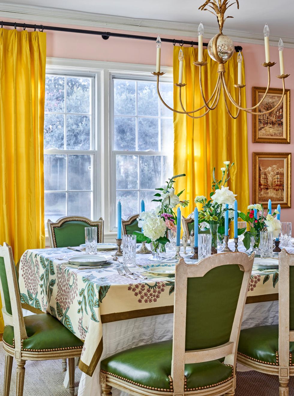 dining room with blush walls and yellow curtains