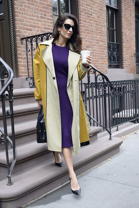 Amal Clooney Wears A Purple Dress And Mustard Coat In New York City