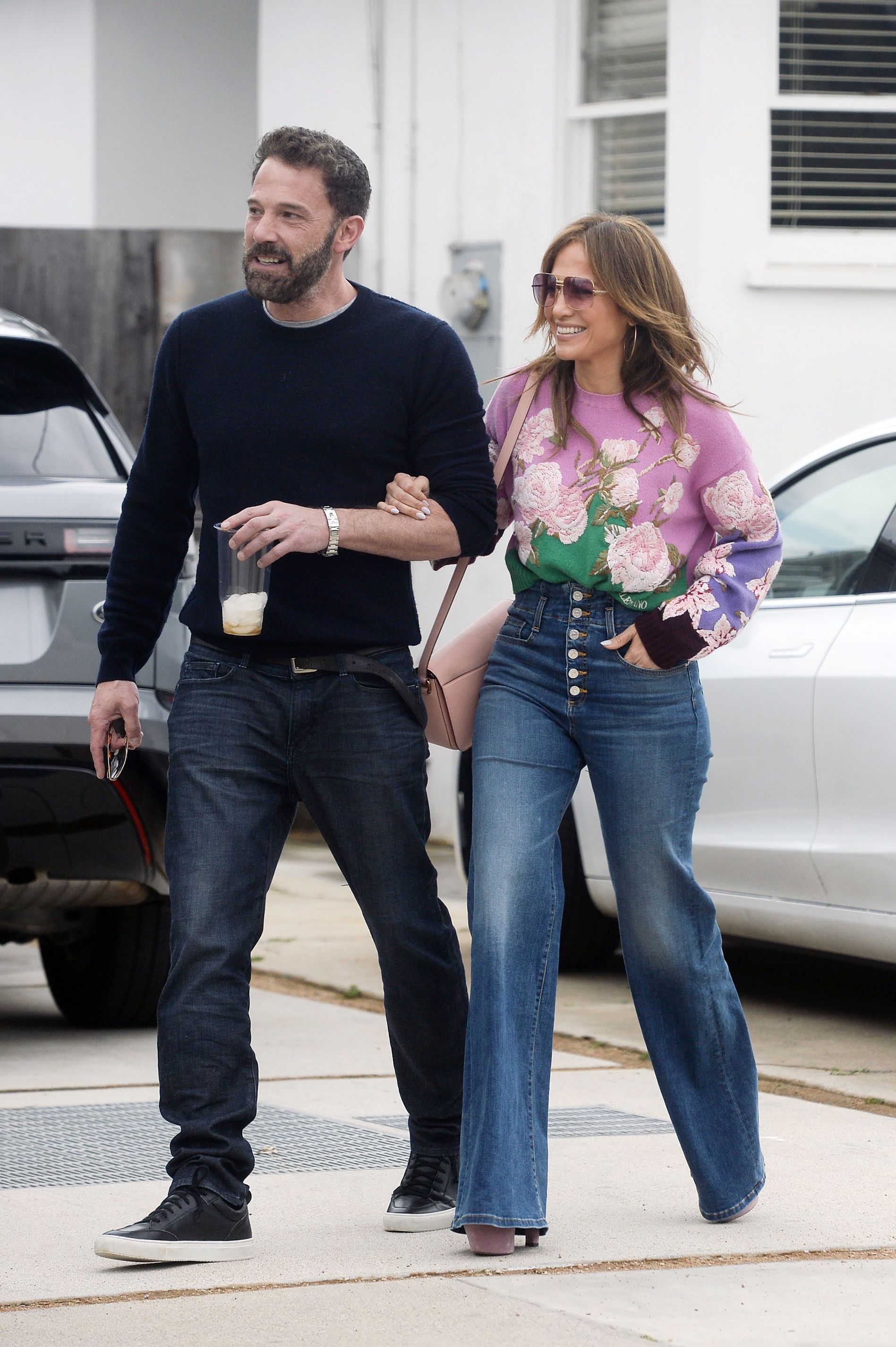 See Jennifer Lopez Re-wear a Floral Valentino Sweater with Denim Bell- Bottoms