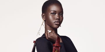 Hair, Hairstyle, Beauty, Lip, Skin, Music artist, Cheek, Neck, Black hair, Model, 
