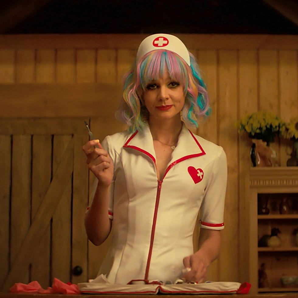 a character in a nurse outfit holding a tool beside a book a character in a nurse outfit holding a tool beside a book