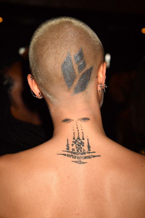 Tattoo, Neck, Shoulder, Skin, Back, Forehead, Joint, Arm, Font, Flesh, 