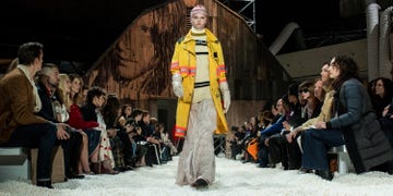 Fashion, Runway, Fashion show, Yellow, Event, Fashion model, Public event, Fashion design, Performance art, Outerwear, 