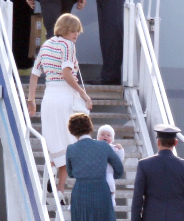 EXCLUSIVE: Prince William Seen For The First Time As Prince Charles And Princess Diana Board A Plane While Filming The Crown