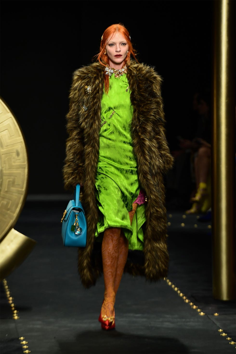 Fashion show, Fashion, Fashion model, Clothing, Runway, Fur, Fur clothing, Fashion design, Outerwear, Long hair, 