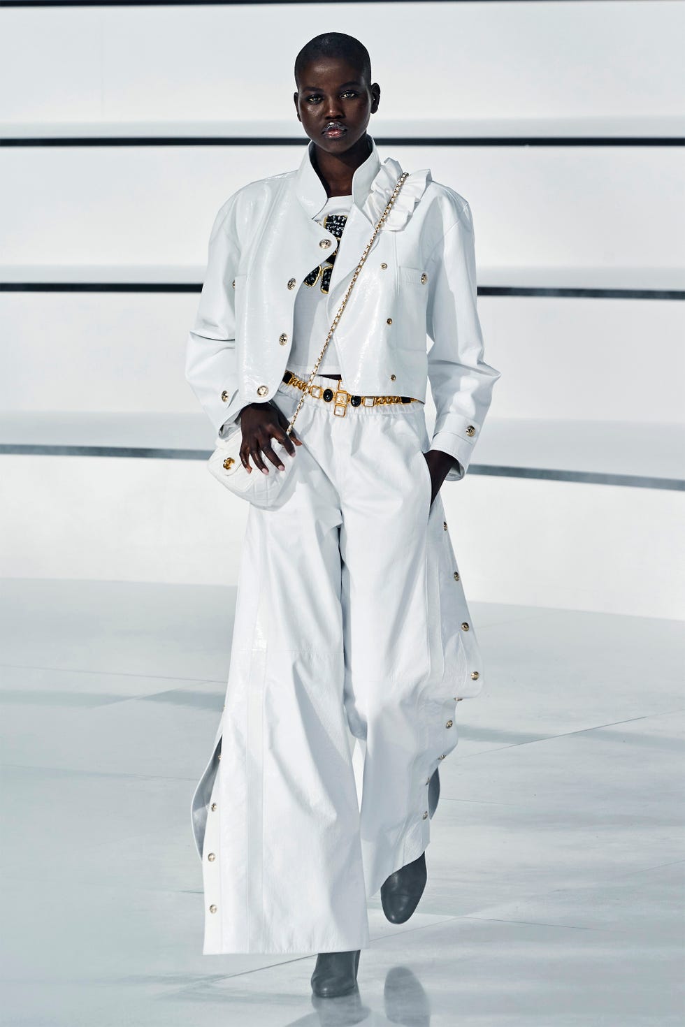 White, Fashion, Robe, Uniform, Fashion design, Runway, Street fashion, Formal wear, Suit, 