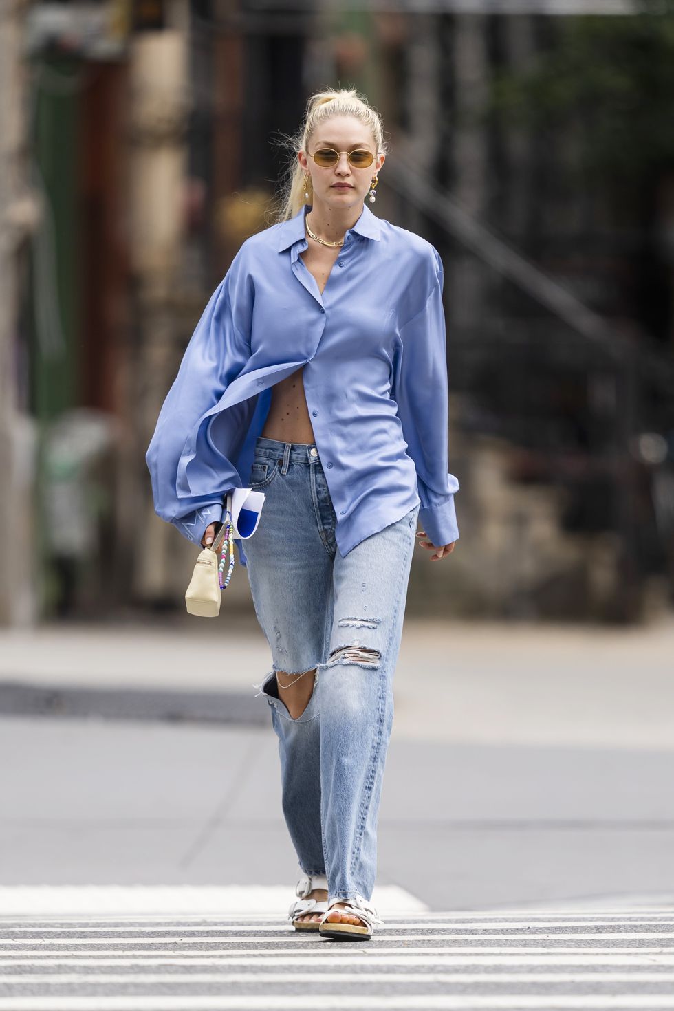 Gigi Hadid's Cornflower Blue Shirt Is a Perfect Transition Piece