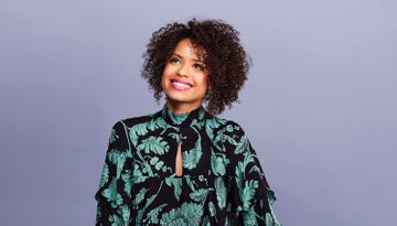 Hair, Green, Hairstyle, Fashion, Afro, Black hair, Outerwear, Smile, Fashion design, Dress, 