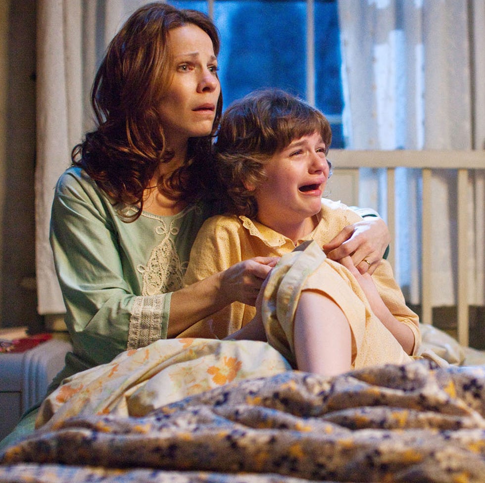 THE CONJURING, from left: Lili Taylor, Joey King, 2013. ph: Michael Tackett/©Warner Bros. Pictures/c