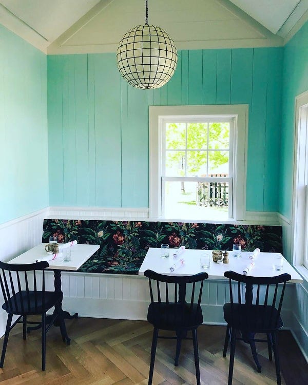Green, Room, Interior design, Floor, Furniture, Table, Light fixture, Ceiling fixture, Ceiling, Flooring, 