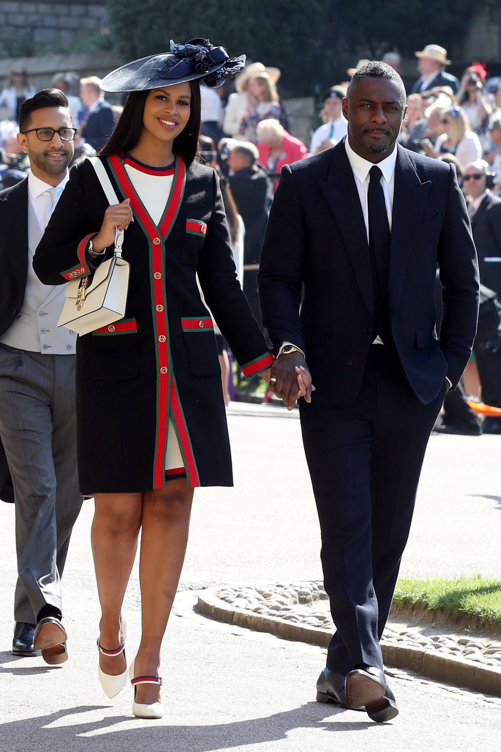 Uniform, Suit, Fashion, Event, Formal wear, Outerwear, Dress, Gesture, White-collar worker, Style, 