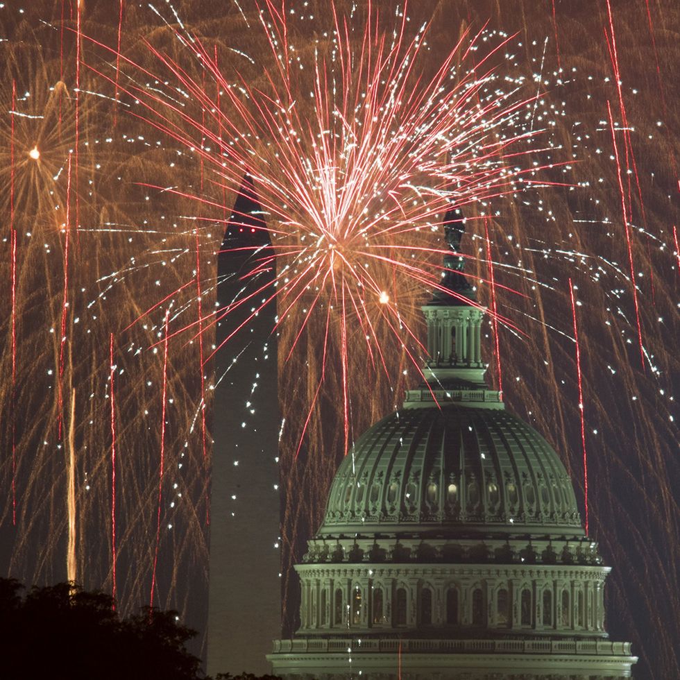 fireworks explode over the national mall as the us capitol r and national monument are seen on july 4, 2017, in washington, dc  afp photo  paul j richards        photo credit should read paul j richardsafp via getty images