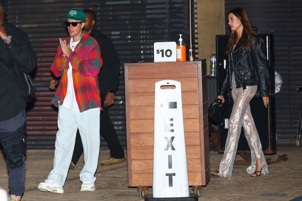 Hailey Bieber Wears Sheer Silver Pants on Date Night with Justin