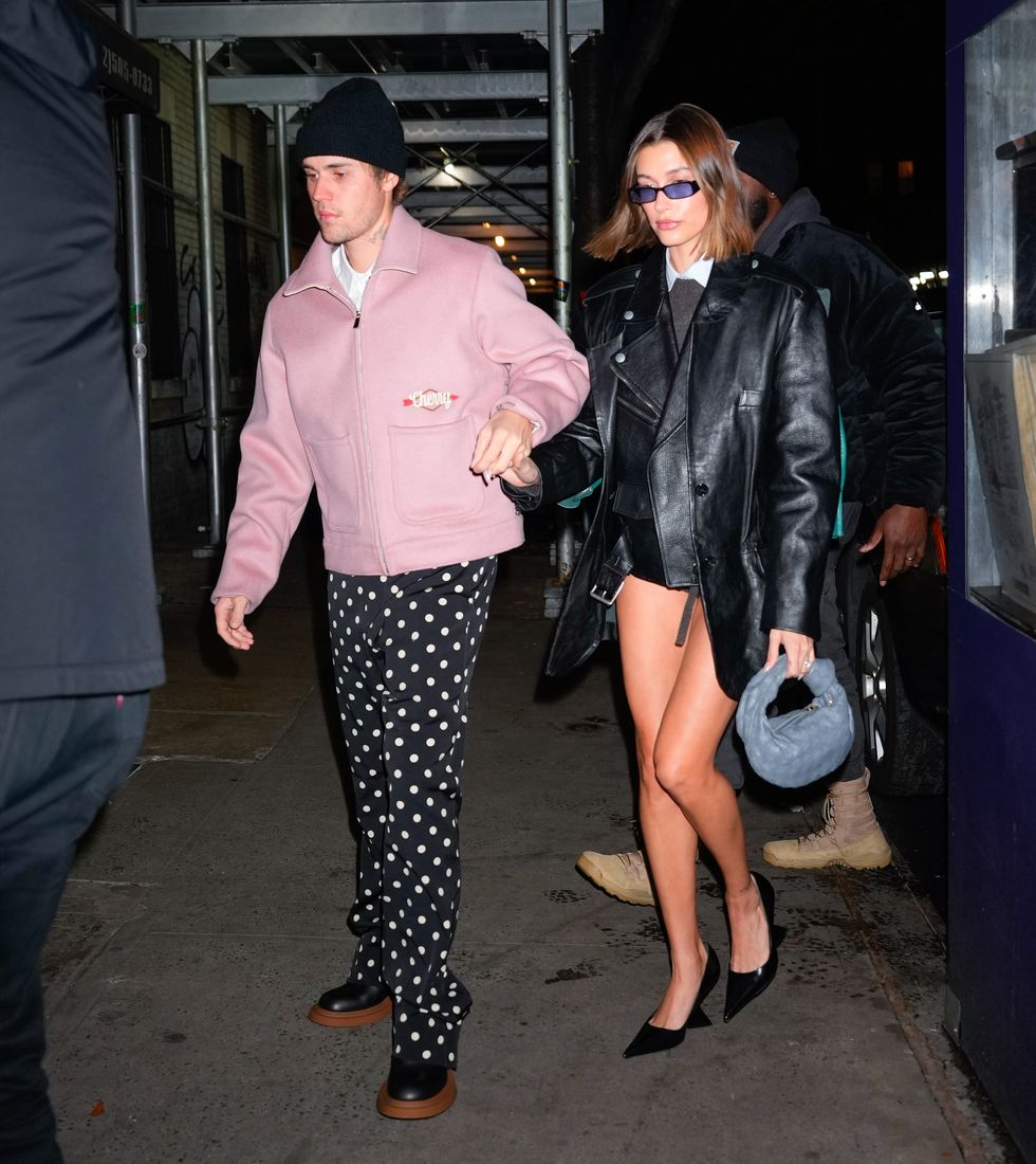 01242023 exclusive justin bieber and hailey bieber head to dinner in new york city hailey wore a leather jacket, matching vest, and heels justin wore a beanie, pink jacket, polka dot trousers, and black shoes video availablesalestheimagedirectcom please bylinetheimagedirectcomexclusive please email salestheimagedirectcom for fees before use