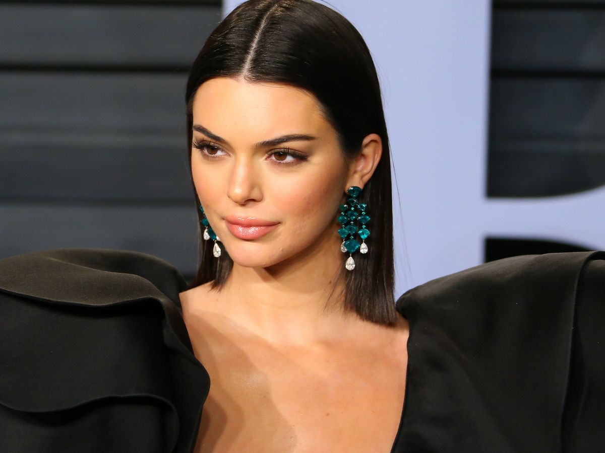 Kendall Jenner shows off a bizarre Chanel ankle purse