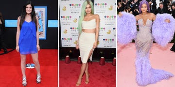 Clothing, Dress, Red carpet, Carpet, Fashion, Fashion model, Cocktail dress, Shoulder, Flooring, Footwear, 