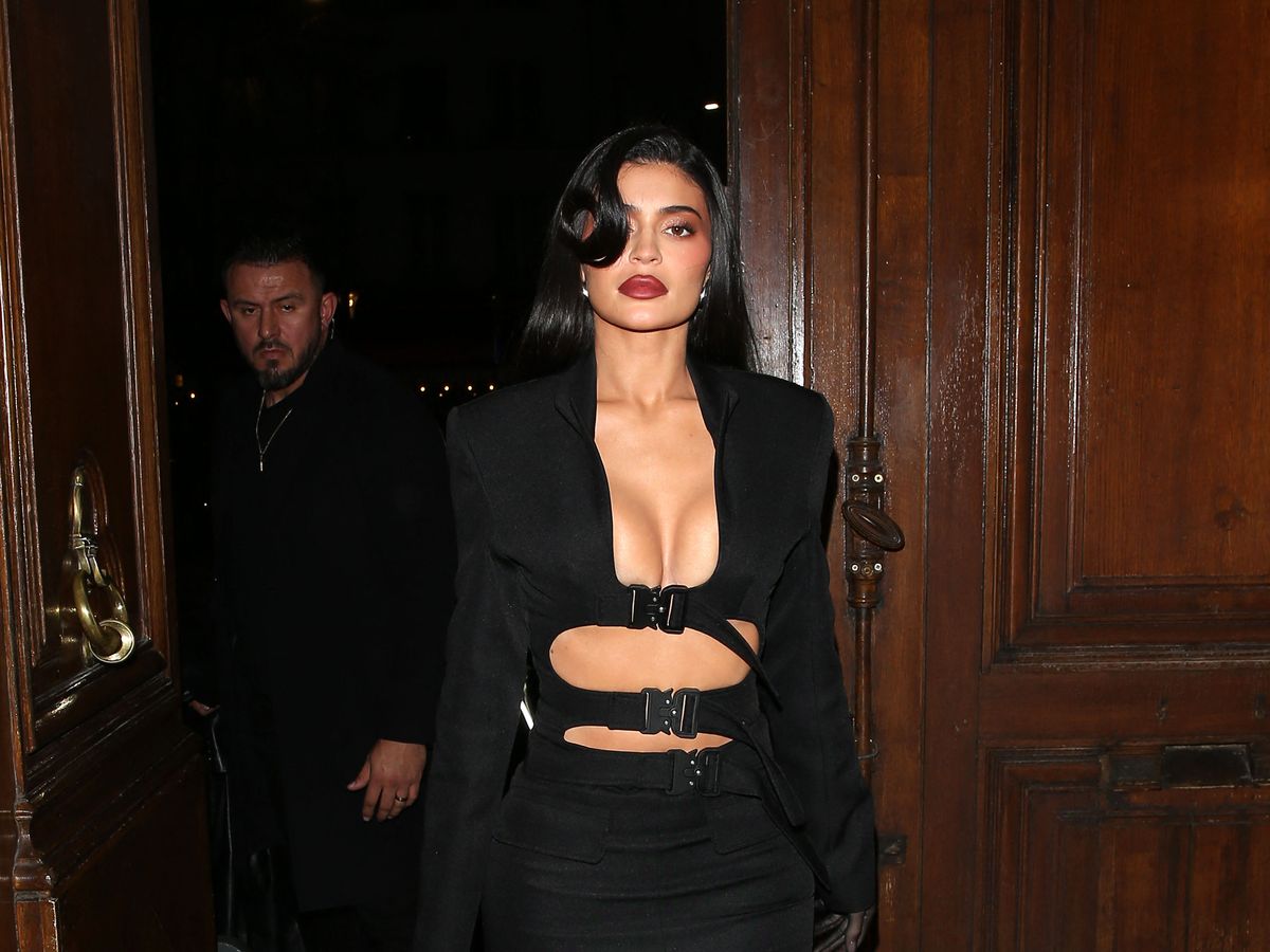Kylie Jenner looks stunning in a black skirt and bra top while leaving  dinner at Costes Hotel in Paris, France-250124_2