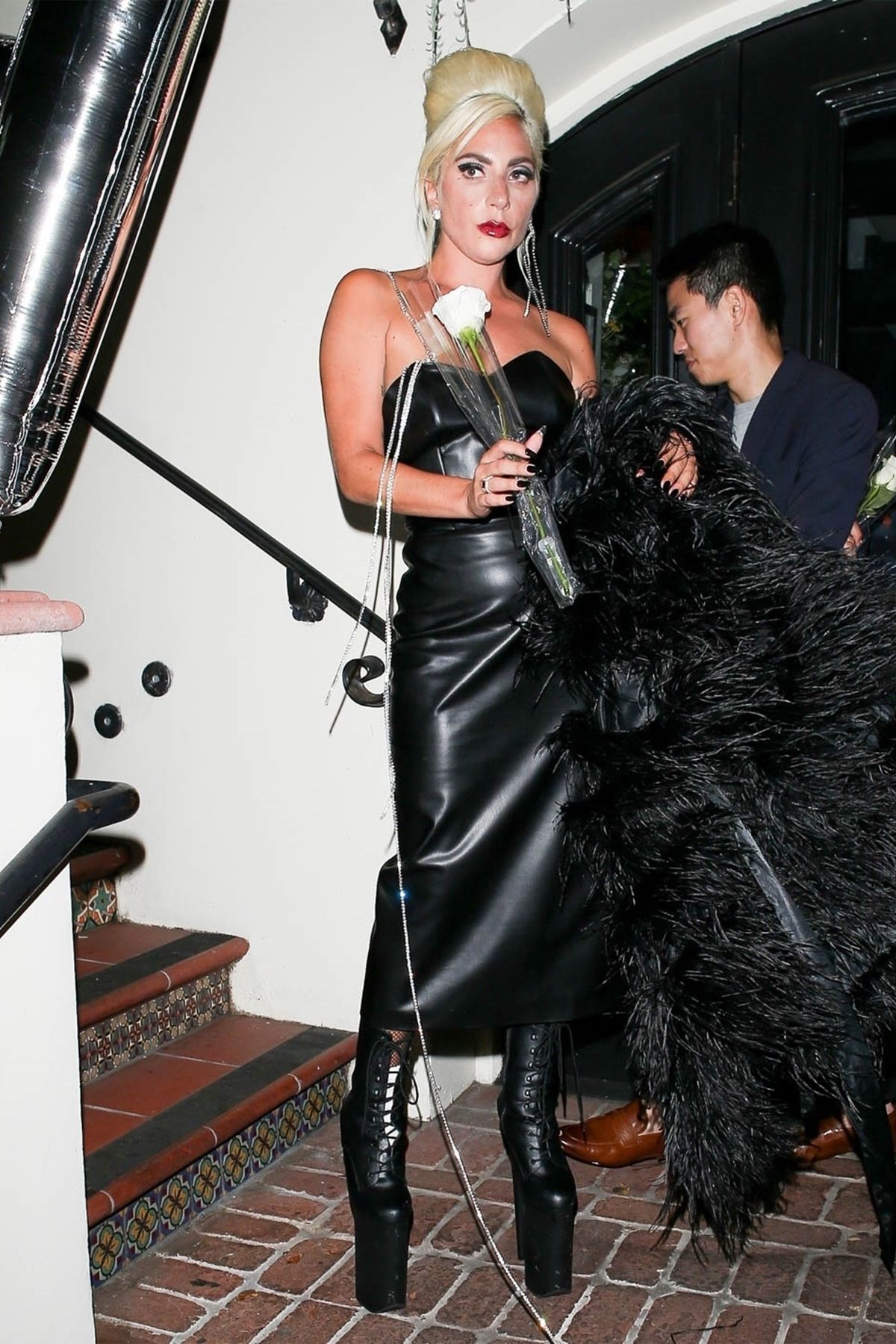 Lady Gaga brings the theatrics as she exits her Haus Laboratories party!