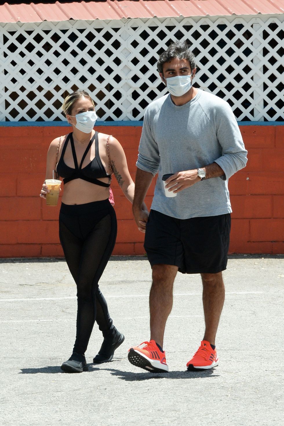 exclusive singer lady gaga and boyfriend michael polansky hold hands as they grab morning coffee in hollywood 30 may 2020 pictured lady gaga michael polansky photo credit mega themegaagencycom 1 888 505 6342 mega agency tagid mega674660021jpg photo via mega agency
